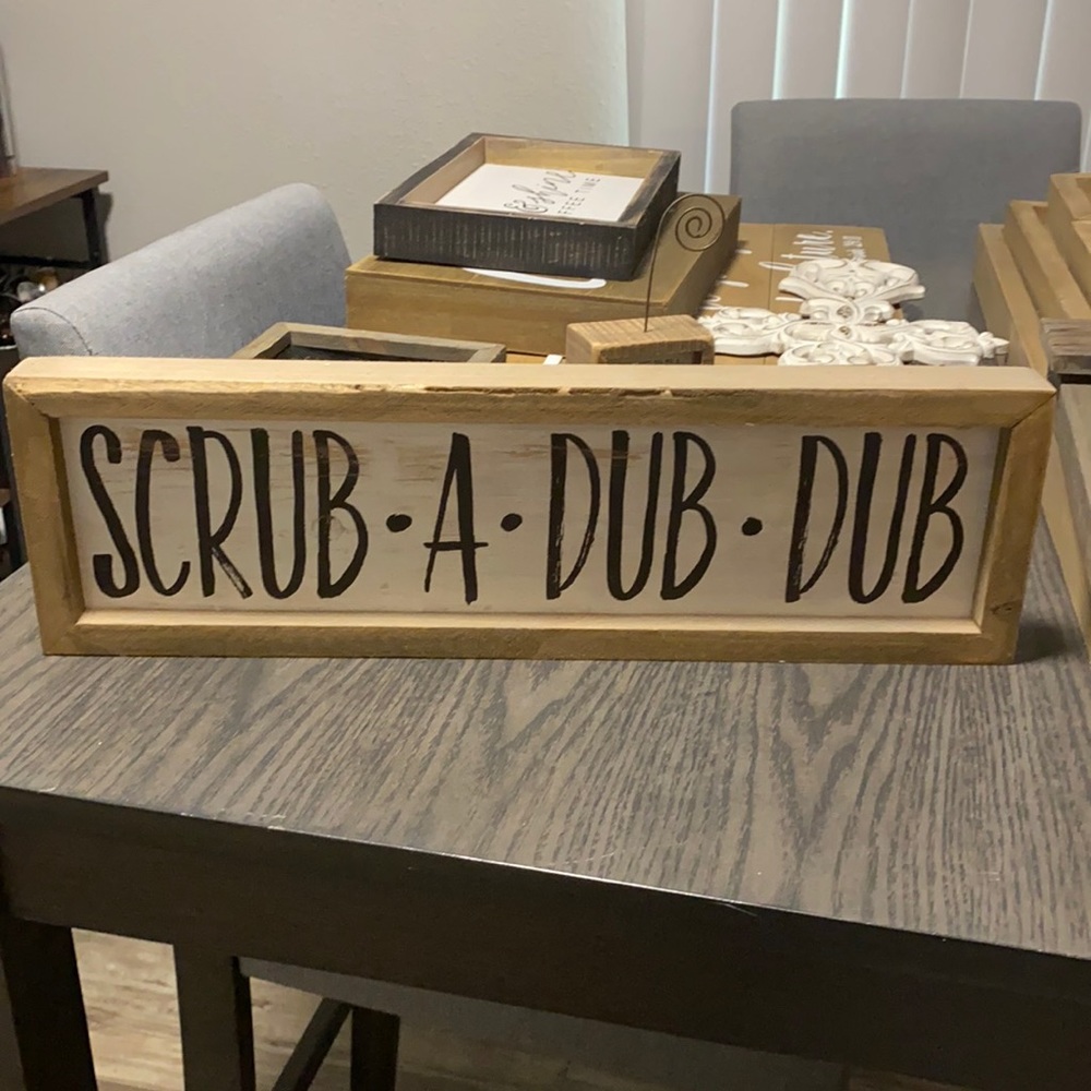 “Scrub a dub dub” sign